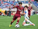 Yutaro Oda, left, plays for Vissel Kobe as Hearts are keen to sign him. Pic: Getty Images