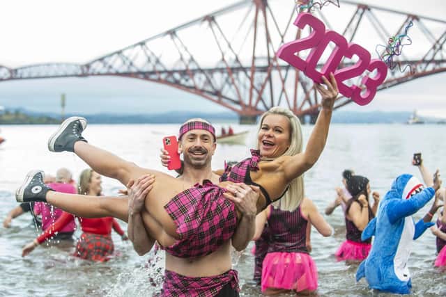 Joda Quigley and John Denovan were among the participants in an unofficial Loony Dook at South Queensferry on New Year's Day. Picture: Lisa Ferguson