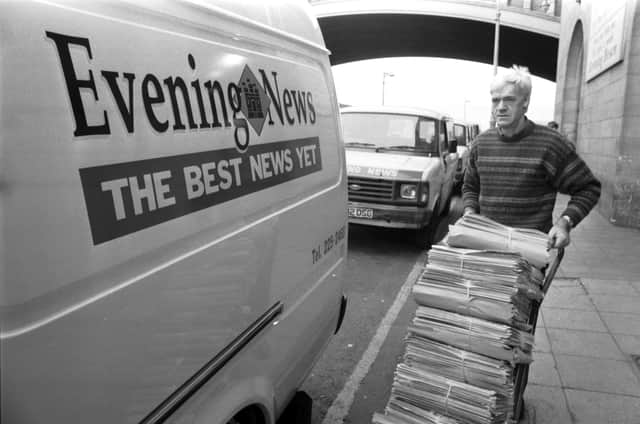 Copies of the paper are loaded onto a van for delivery outside the former office building  on Market Street