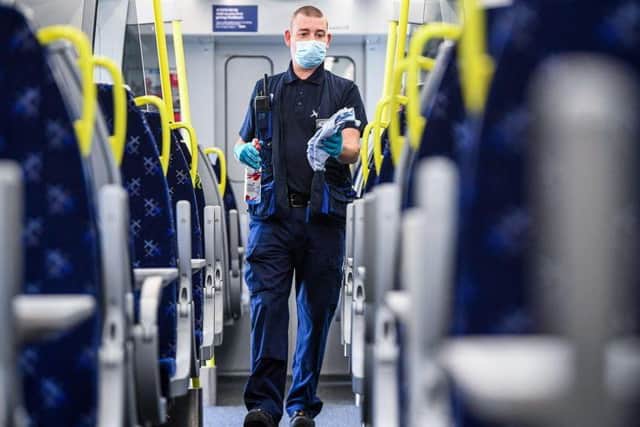 ScotRail staff will be wearing face masks to protect themselves and passengers. Pic: Getty