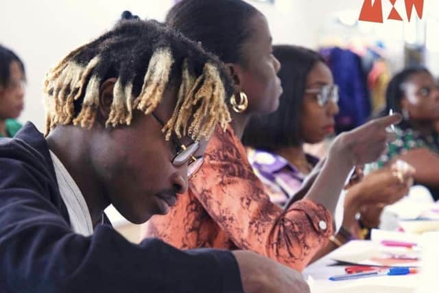 Fashion design industry experts attending a workshop in Ghana