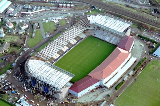 Aerial photo of Murrayfield Stadium as construction work continued in November 1992. The first phase was completed in January 1993 with the new north and south stands opening. In February 1994 the centre section of the new West Stand opened. In 1994, Murrayfield completed a £50-million renovation where floodlights were installed for the first time.