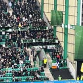 Hibs fans display the banner during the opening minutes of their cinch Premiership encounter with St Mirren. Picture: Joel Sked