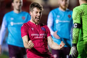 Brora's Martin MacLean celebrates his side's Scottish Cup victory over Hearts in March 2021. Picture: Ross Parker / SNS