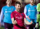 Brora's Martin MacLean celebrates his side's Scottish Cup victory over Hearts in March 2021. Picture: Ross Parker / SNS