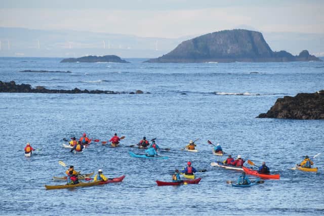 On a mission: Lothian Sea Kayak Club members head to Lamb Island to eradicate rats.
Pic: John Hunt