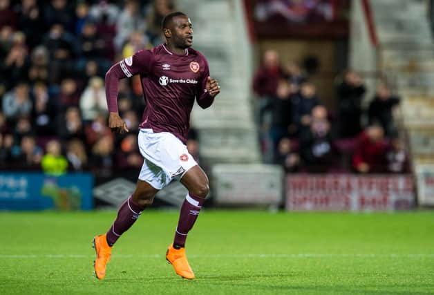 Clevid Dikamona has asked Hearts to terminate his contract but would happily return.