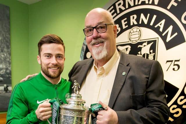 Frank Dougan, right, with Lewis Stevenson and the Scottish Cup trophy