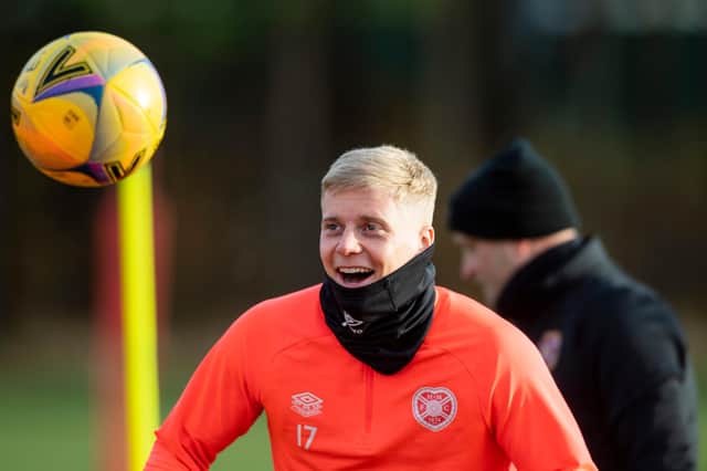 On-loan wing-back Alex Cochrane, pictured training at Oriam yesterday, says he has not heard from parent club Brighton about his long-term future