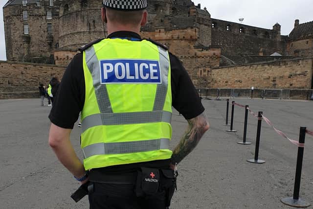 Police Scotland officer wearing Naloxone pouch on esplanade of Edinburgh Castle.