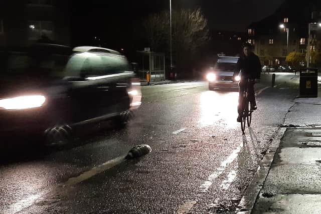 A cyclist with no lights or hi-vis jacket can be hard to spot in the dark. Picture: The Scotsman