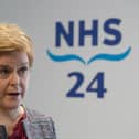 First Minister Nicola Sturgeon during her visit to open NHS 24's new centre at Hillington, Glasgow. Picture: Andrew Milligan/PA Wire