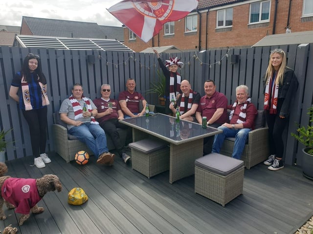 All set up in the garden for a great afternoon cheering Hearts ... even Luna's a Jambo!
Pic: Sonia Rafferty