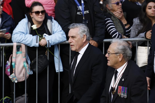 Former prime minister Gordon Brown near Mercat Cross ahead of the procession of Queen Elizabeth II's coffin from the Palace of Holyroodhouse to St Giles' Cathedral, Edinburgh, following her death on Thursday.