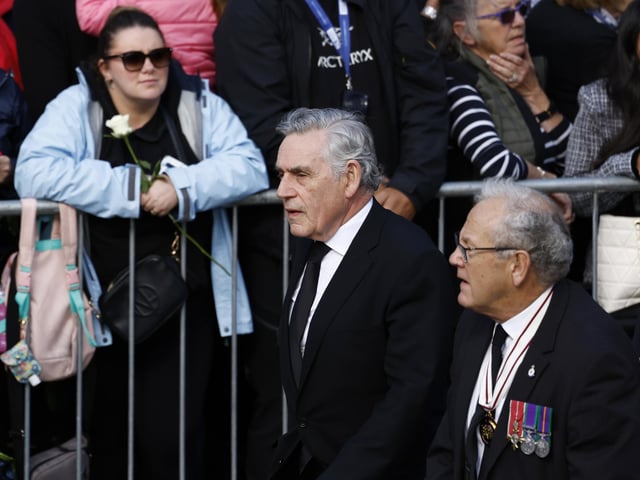Former prime minister Gordon Brown near Mercat Cross ahead of the procession of Queen Elizabeth II's coffin from the Palace of Holyroodhouse to St Giles' Cathedral, Edinburgh, following her death on Thursday.