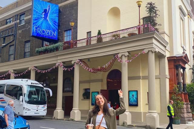 Caitlin Tipping, outside the Theatre Royal Drury Lane, where she will take the stage in Disney's Frozen the Musical next