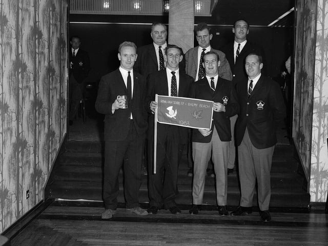 Royal High School rugby players present a flag to the Canadian Balmy Beach players after their match in October 1963.
