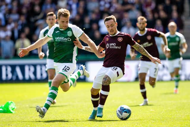 Barrie McKay in action against Chris Cadden during Sunday's Edinburgh derby at Easter Road. Picture: SNS