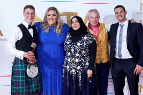 Peter Sawkins, Laura Adlington and other cast members of The Great British Bake off in the press room after winning the Challenge Show award at the National Television Awards 2021 held at the O2 Arena, London. (Picture credit: Ian West/PA Wire)