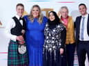 Peter Sawkins, Laura Adlington and other cast members of The Great British Bake off in the press room after winning the Challenge Show award at the National Television Awards 2021 held at the O2 Arena, London. (Picture credit: Ian West/PA Wire)