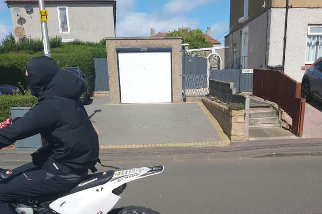 Man claims he was threatened by masked youth on bike