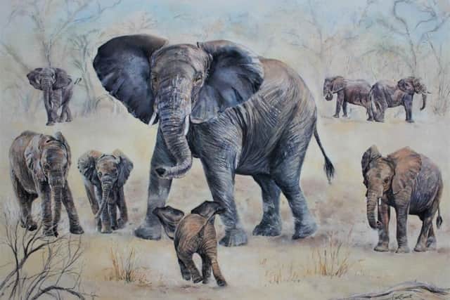 Carol Barrett's painting of elephants is being auctioned to raise money for wildlife conservation.