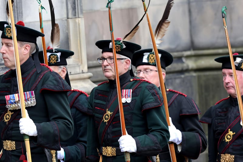 The Royal Company of Archers arrive at St Giles' Cathedral ahead of the service on Wednesday.