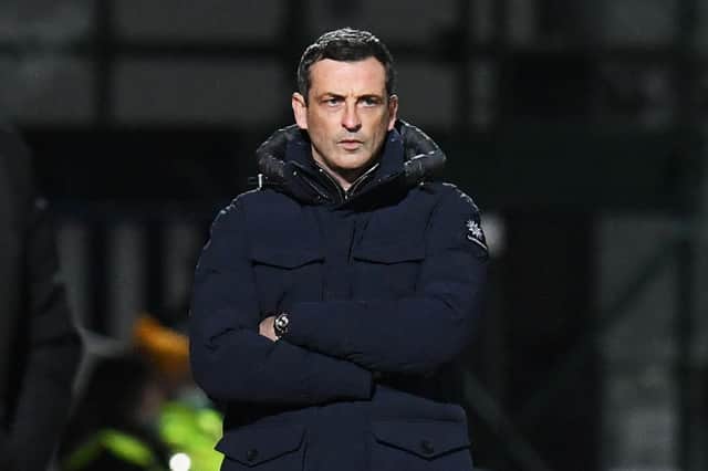 Jack Ross looks on as Hibs take on Ross County in Dingwall