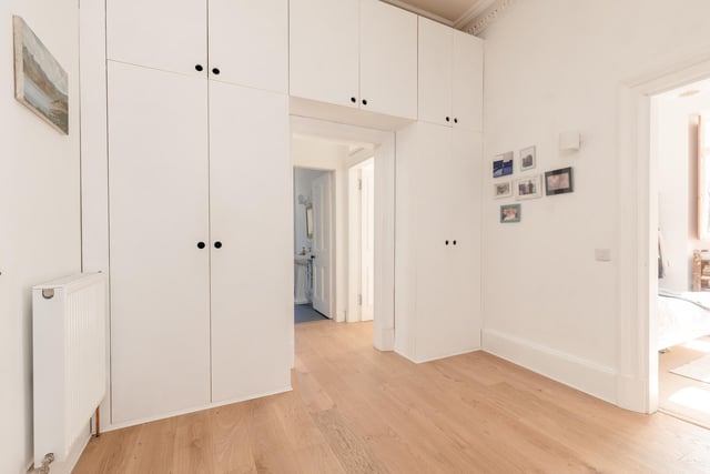 The property benefits from lots of storage space including these stylish hall cupboards.