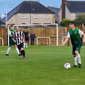 Oscar MacIntyre looks to start an attack from left-back at New Countess Park