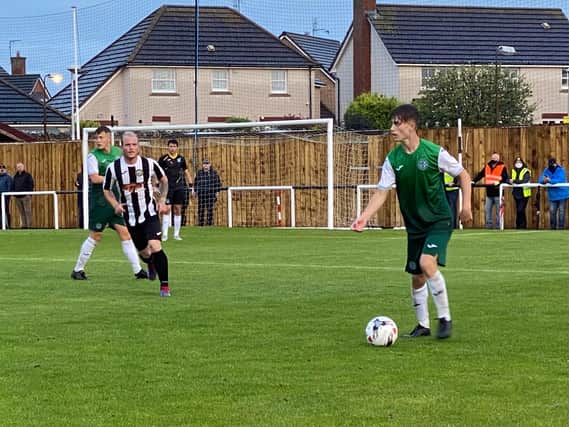 Oscar MacIntyre looks to start an attack from left-back at New Countess Park