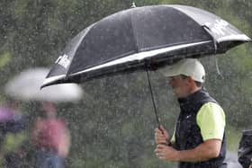 Rory McIlroy shelters unfer his umbrella during final round of the Dubai Duty Free Irish Open at Mount Juliet. Picture: Patrick Bolger/Getty Images.