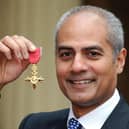 George Alagiah at Buckingham Palace after collecting his OBE from the Queen.