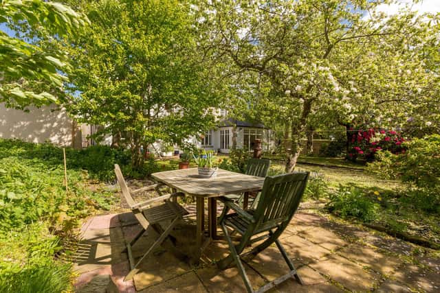 The property features a large amount of garden space.
