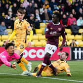 Hearts forward Garang Kuol has his shot at goal saved by Livingston keeper Shamal George just a couple of minutes after coming on at half time. Picture: Ross Parker / SNS