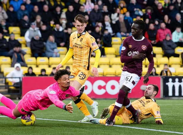 Hearts forward Garang Kuol has his shot at goal saved by Livingston keeper Shamal George just a couple of minutes after coming on at half time. Picture: Ross Parker / SNS