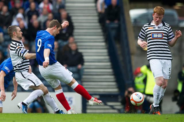 David Templeton (9) scores at Hampden for Rangers - in a Third Division match against Queen's Park in 2013