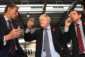 Prime Minister Boris Johnson and Douglas Ross MP, leader of the Scottish Conservative, at the start of the General Election campaign. Mr Ross is out of moves after changing his position on Mr Johnson four times, writes Alex Cole-Hamilton. PIC: Stefan Rousseau