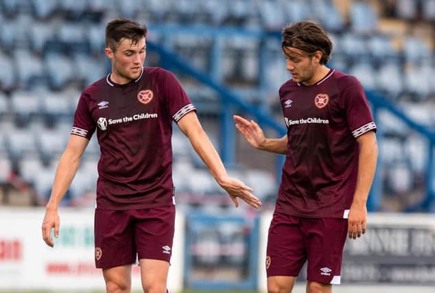 Hearts' Peter Haring (right) and John Souttar are fighting back from injury.