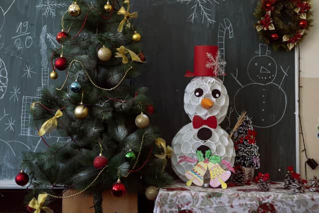 Christmas is the time for family, so make sure your plans suit everyone by planning around the school Christmas holidays in Edinburgh. Photo: Dusan Stankovic / Getty Images / Canva Pro.