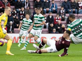 Hearts' Lawrence Shankland scores to make it 2-1 against Celtic.