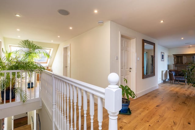 Climbing the stairs, you find an extensive landing which gives access to four bedrooms, a family bathroom and a large terrace which overlooks the rear garden.