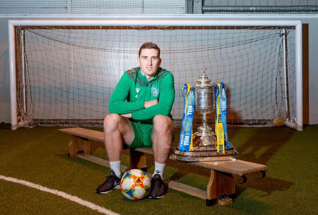 Hibs' Paul Hanlon poses with the Scottish Cup ahead of the weekend semi-final against Hearts. Photo by Mark Scates/SNS Group