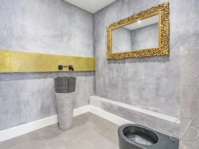 It's only the downstairs toilet, but it is delightfully presented, complete with a low-flush WC and a cute wash hand basin.