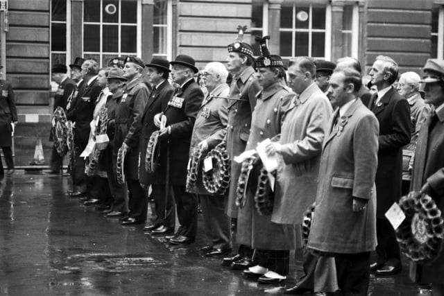 Representatives of the British Legion and Armed Services wait to lay wreaths in honour of former comrades at the 1989 Remembrance Day ceremony outside Edinburgh City Chambers.