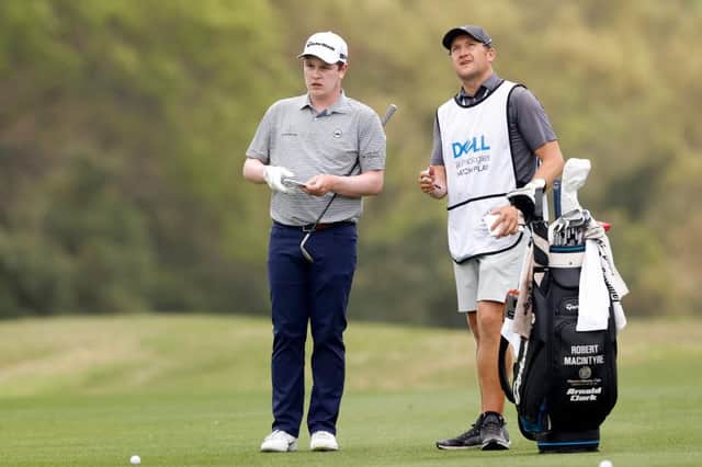 Bob MacIntyre and caddie Mikey Thomson talk tactics during the World Golf Championships-Dell Technologies Match Play at Austin Country Club in Texas. Picture: Michael Reaves/Getty Images.