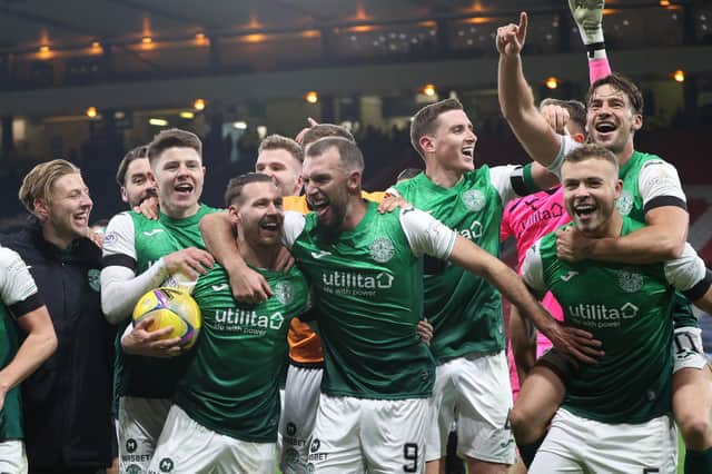 Christian Doidge, centre, celebrates victory over Rangers in the Premier Sports Cup semi-final