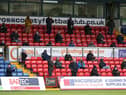 Fans look on from socially distanced positions in the stands during the Ladbrokes Scottish Premiership match between Ross County and Celtic at Global Energy Stadium on September. (Pic: Getty Images)