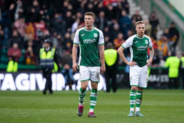 Will Fish and Jimmy Jeggo cut a frustrated look during Hibs' 3-1 defeat at home to Motherwell. Picture: SNS