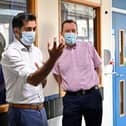 Scotland's clinical director Jason Leitch, right, seen with Health Secretary Humza Yousaf, is right that Covid is not over (Picture: Jeff J Mitchell/pool/AFP via Getty Images)